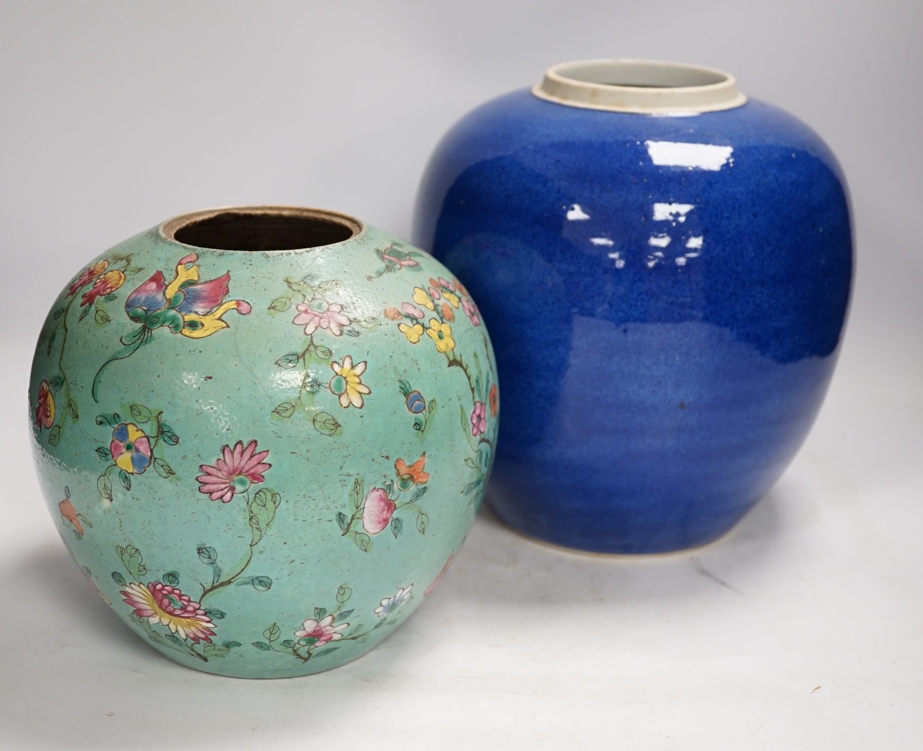 A Chinese powder blue jar, late 19th century, drilled hole to base and a turquoise glazed ground jar, blue vase 22cm high. Condition - turquoise jar cracked and chipped